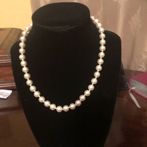 White pearl necklace.